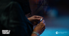 Picture  of a person's hands holding communion wafer and small cup of juice. The background is faded stained glass. Illustration of a loaf of bread and wine glass. Maundy Thursday. United Church of Christ logo